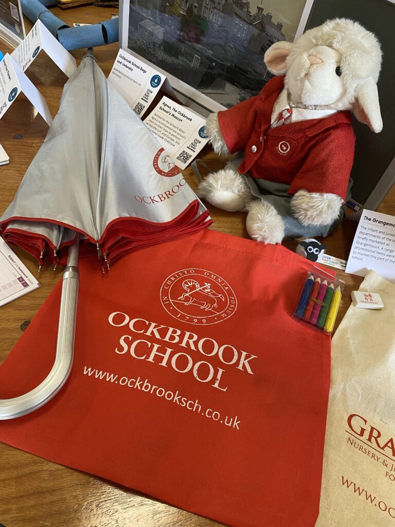 Ockbrook School memorabilia including a cuddly sheep and umbrella