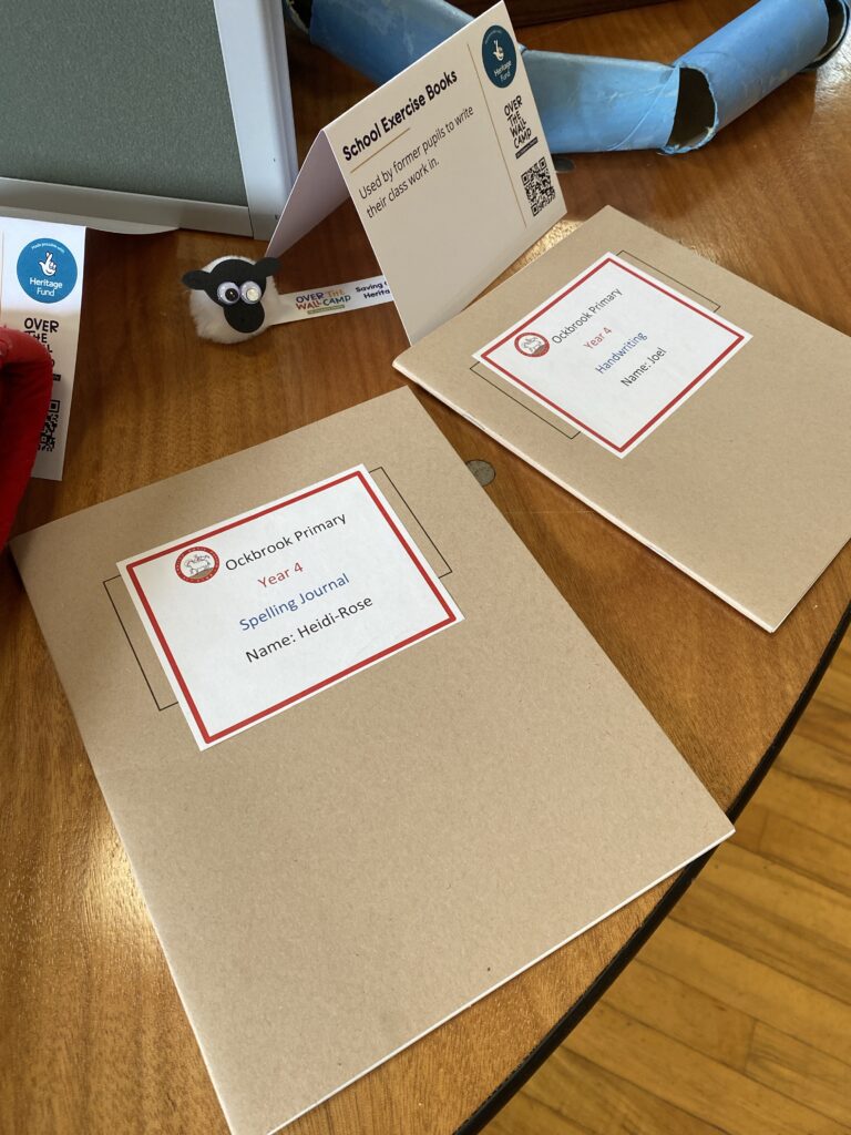 Two school exercise books
